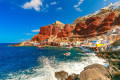 Waves crashing on the Bay oo Ammoudi in Santorini