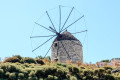 A Cycladic windmill standing proud outside the village of Apeiranthos