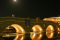 Beautifully illuminated bridge in Naoussa, Paros